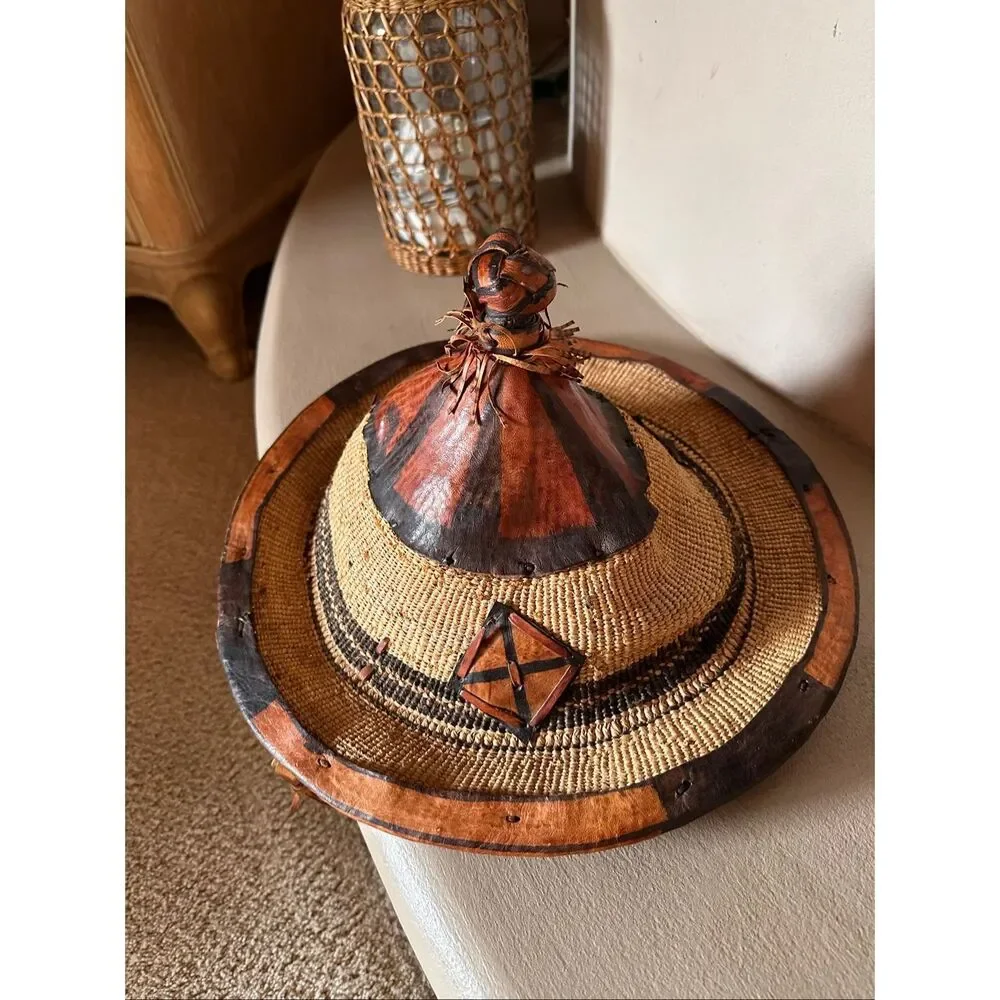 Vintage handwoven basketry hat with leather trim. Tribal/Boho decor